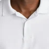 Le polo de golf Performance : uni et rayé