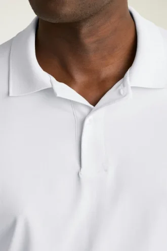 Le polo de golf Performance : uni et rayé