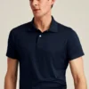 Le polo de golf Performance : uni et rayé