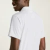 Le polo de golf Performance : uni et rayé