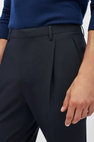 Pantalon en laine stretch à plis