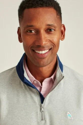 Polo en molleton stretch à demi-fermeture éclair