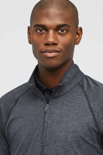 Polo Golf Tech à demi-zip